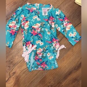 3/6 month swimsuit with ruffle butt and sun hat with velcro chin strap